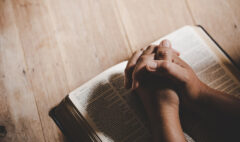 spirituality-religion-hands-folded-prayer-holy-bible-church-concept-faith