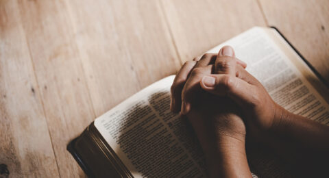 spirituality-religion-hands-folded-prayer-holy-bible-church-concept-faith