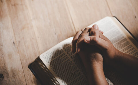 spirituality-religion-hands-folded-prayer-holy-bible-church-concept-faith